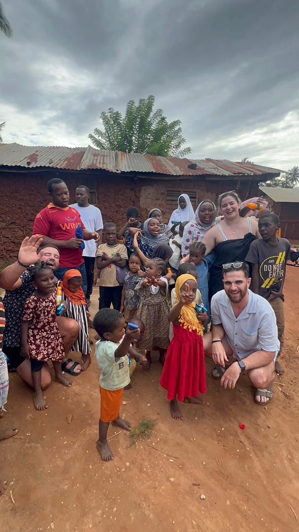 Guests sharing a village visit with Zanzibar families